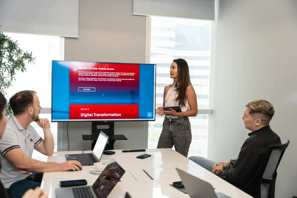 DBot Software team brainstorming innovative AI solutions for a client during a strategy session